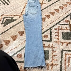 MOTHER Light Blue Flare Jeans with Raw Hem